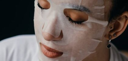 A woman using a face mask